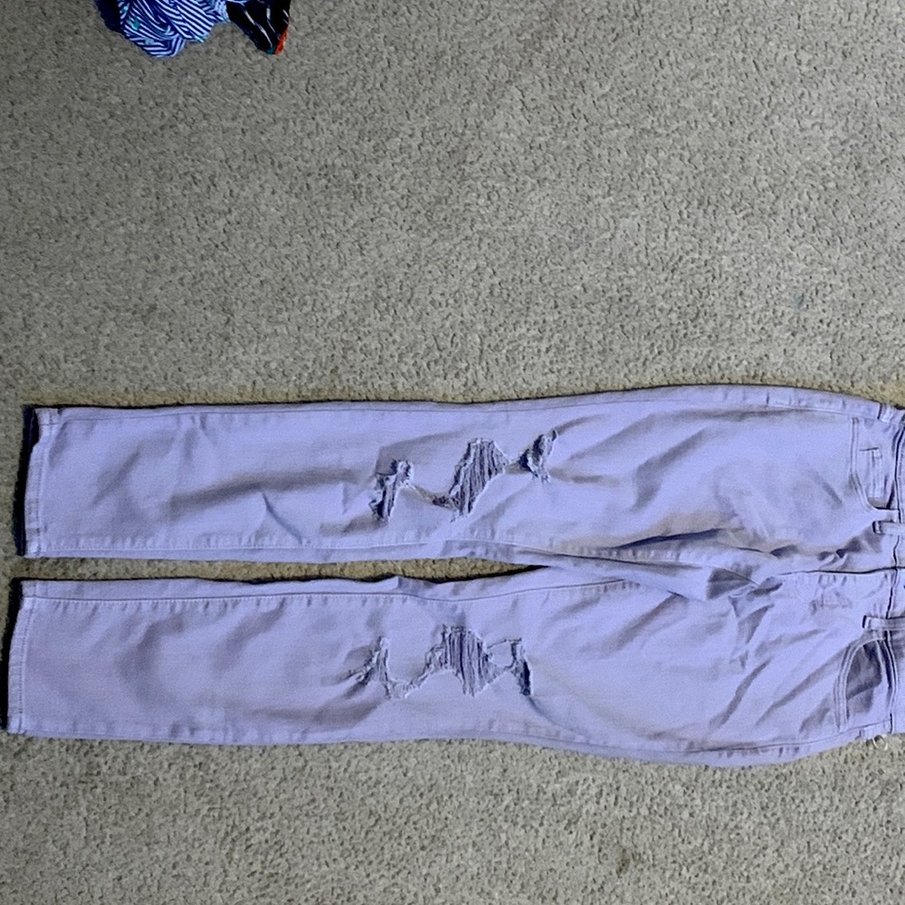 Purple ripped jeans